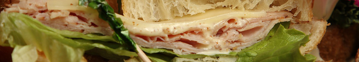 Eating Sandwich at The Bakery Nosh.